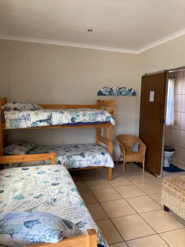 Una cama o camas en una habitación de Pole Pole holiday home