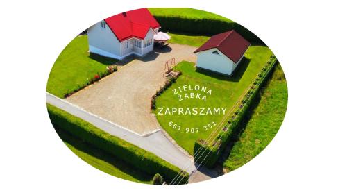 a rendering of a house on a grassy field at Zielona Żabka in Polańczyk