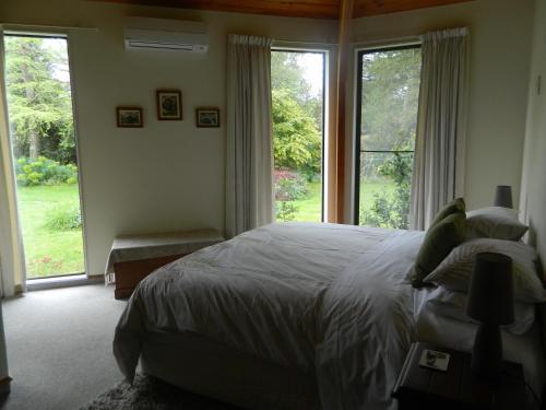Un pat sau paturi într-o cameră la Antares Homestay