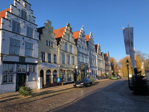 Photo de la galerie de l'établissement Wohnen im Denkmal/Eckbäckerhaus beste Altstadlage, à Friedrichstadt