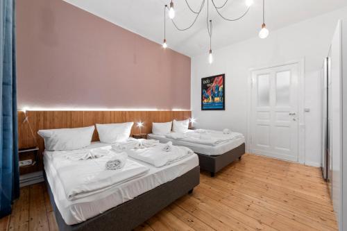Postelja oz. postelje v sobi nastanitve primeflats - Apartments Genter Berlin-Wedding