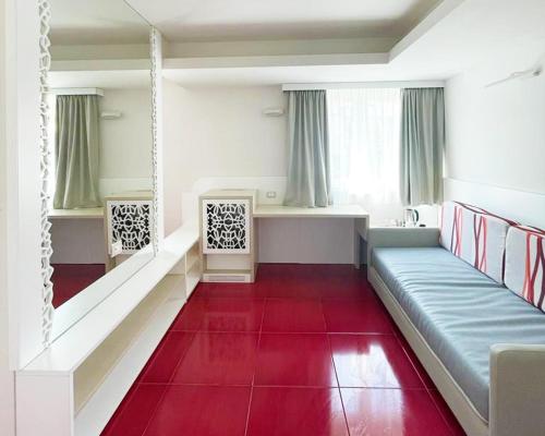 Suite Hotel L'Oasi di Riaciにあるベッド