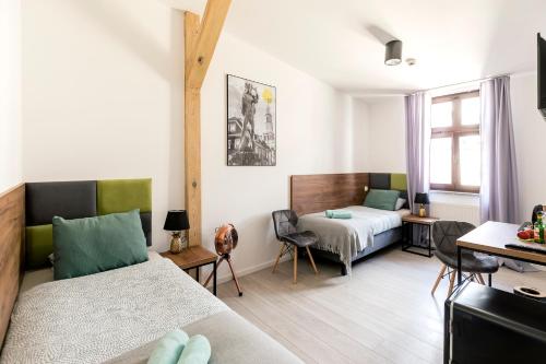 Posteľ alebo postele v izbe v ubytovaní Cooltour