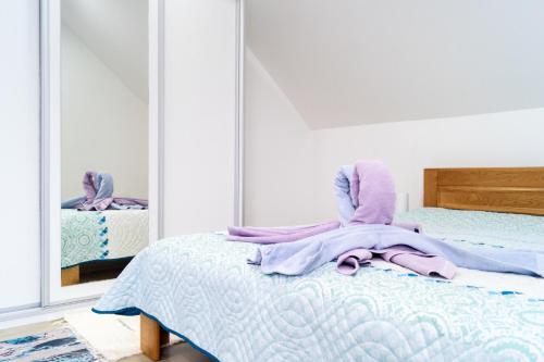 AllOne apartmanにあるベッド