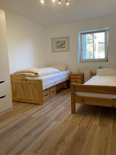 Postelja oz. postelje v sobi nastanitve Familien-Appartement #10 Obermoosen