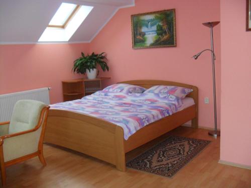 Postel nebo postele na pokoji v ubytování Apartmány Prima