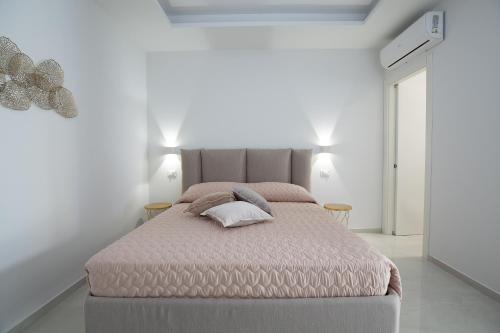 Postel nebo postele na pokoji v ubytování Residence BLANCO III a 100 mt dalla spiaggia