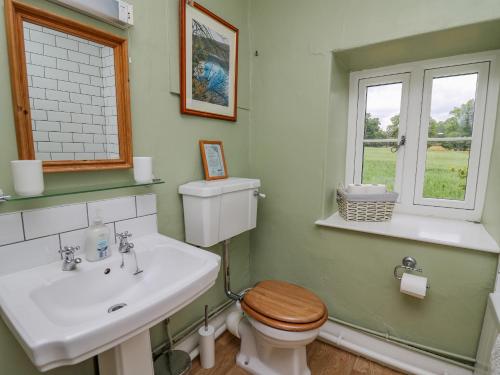 Et badeværelse på Byrdir Cottage