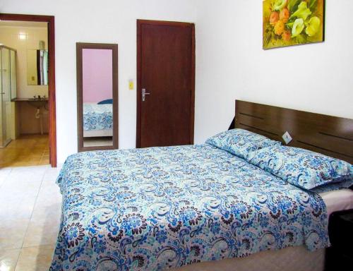Voodi või voodid majutusasutuse Apto c churrasq privativa na Praia de Tabatinga SP toas