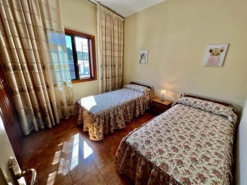 Katil atau katil-katil dalam bilik di Alma In the heart of the Vilaflor! Self check in 24h