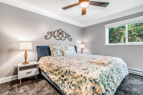 a bedroom with a bed and a ceiling fan at Sugar Ski 632 in Sugar Mountain