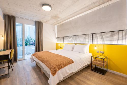 Postel nebo postele na pokoji v ubytování Fort40 Guest House