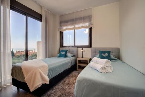 Cama o camas de una habitación en 103 - Luxurious 3 Bed Duplex Penthouse With Stunning Mountain Views