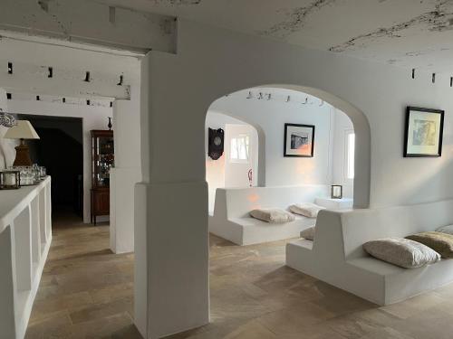 a room with two white pillows and a mirror at La Finquita - Adeje in Adeje