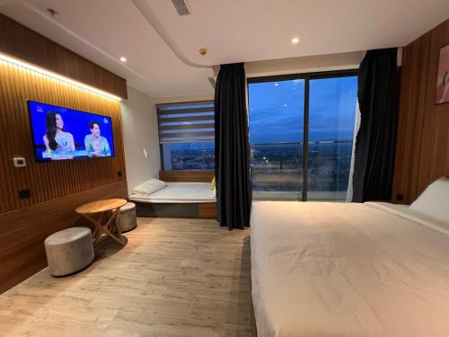 Postel nebo postele na pokoji v ubytování Apec Mandela Phú Yên Hương Giang Condotel