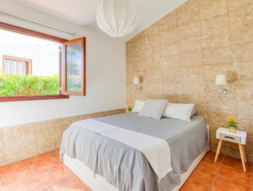 Voodi või voodid majutusasutuse Fast wifi & Relax bungalow Ipanema Gran Canaria toas