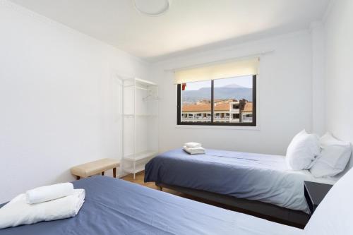 Postel nebo postele na pokoji v ubytování Prime Homes Parque Avoceta