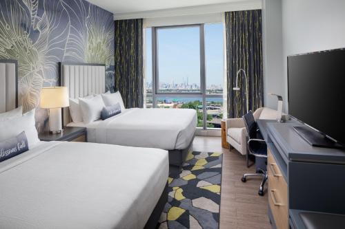 Postel nebo postele na pokoji v ubytování Hotel Indigo Flushing - LaGuardia