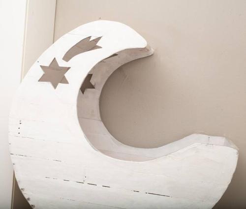 a wooden letter c on the side of a wall at HomeSweetHome Farm Cottage in Nelspruit