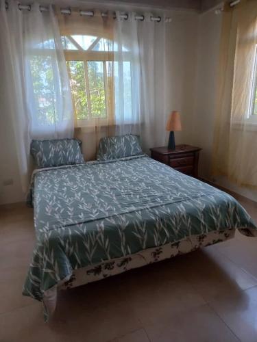 Postel nebo postele na pokoji v ubytování casa maria