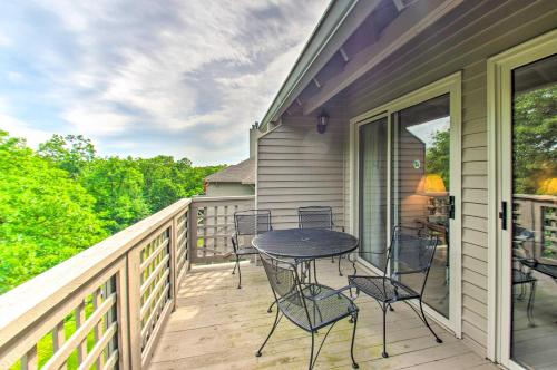a balcony with a table and chairs on it at Idyllic Wintergreen Condo with Resort Amenities in Mount Torry Furnace