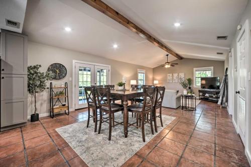 a dining room with a table and chairs at Canyon Lake Hideaway with Fire Pit and Yard! in Canyon Lake