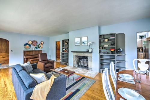 a living room with a couch and a fireplace at Cozy Abode about 3 Mi to Indiana Dunes Natl Park in Chesterton