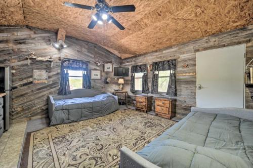 Cama ou camas em um quarto em 2 Rustic Cabins with Porches on Remote Ranch!