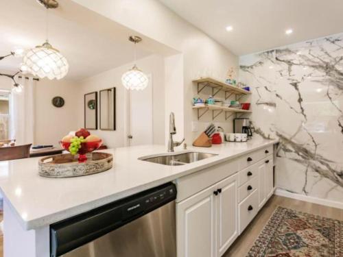 a kitchen with a sink and a counter top at Blue vacation house in Venice