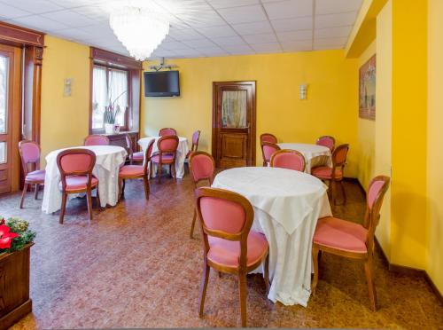 TV a/nebo společenská místnost v ubytování Hotel Bigio