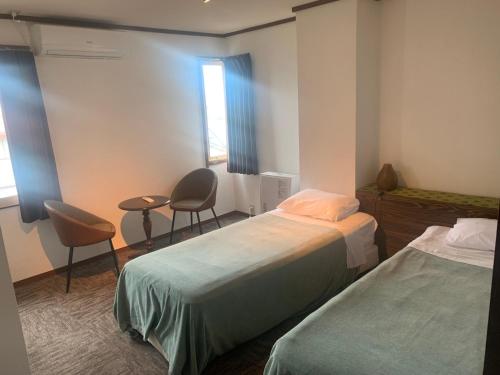 Katil atau katil-katil dalam bilik di Hakuba Ski Condos