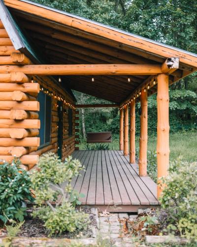 a wooden deck in front of a cabin at Afton Cabin in Afton