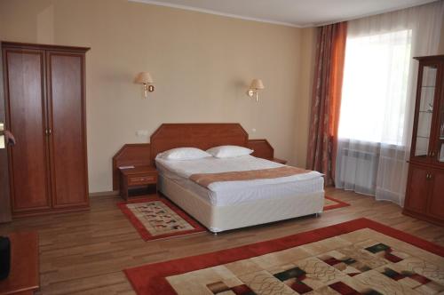 Postel nebo postele na pokoji v ubytování Hotel Ankor