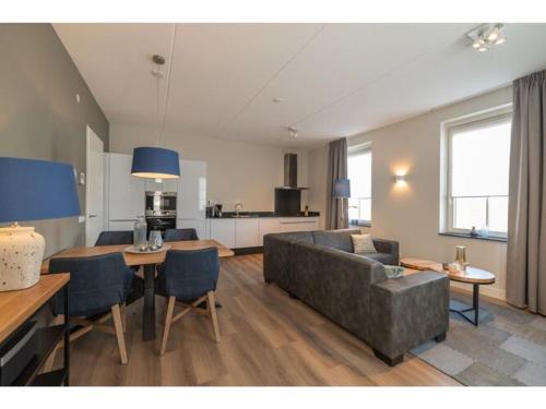 Posezení v ubytování Premium apartment with private wellness in Zeeland