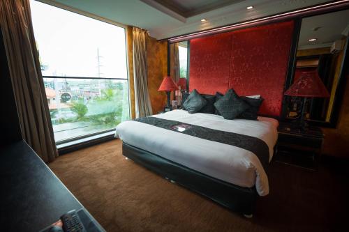 Katil atau katil-katil dalam bilik di Fields Plaza Hotel by ABC