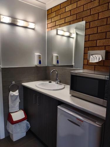 Vonios kambarys apgyvendinimo įstaigoje Motel Woongarra