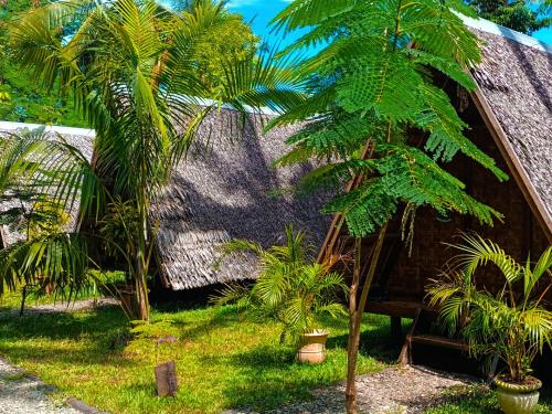 Zahrada ubytování Archery-Asia Nipa Huts Moalboal