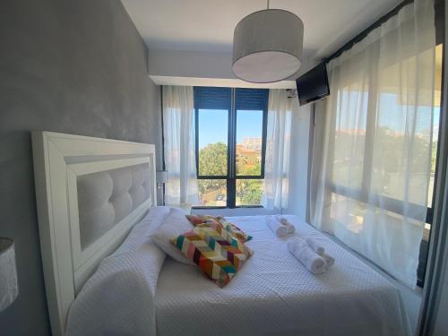 Postel nebo postele na pokoji v ubytování Apartamento Benalmadena playa