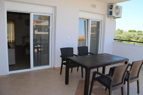 Balkón nebo terasa v ubytování Xanthiotis Apartments