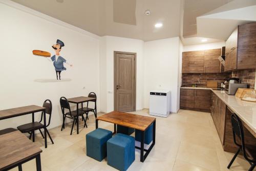 Kuchyň nebo kuchyňský kout v ubytování Hotel Boutique George