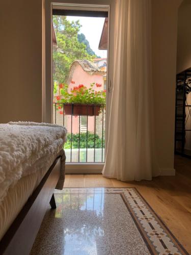 En eller flere senge i et værelse på Il Cortile del Principe