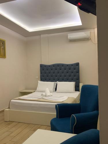 Vila Park Hotel 1 tesisinde bir odada yatak veya yataklar