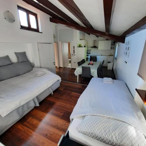 Postel nebo postele na pokoji v ubytování Apartma Rok