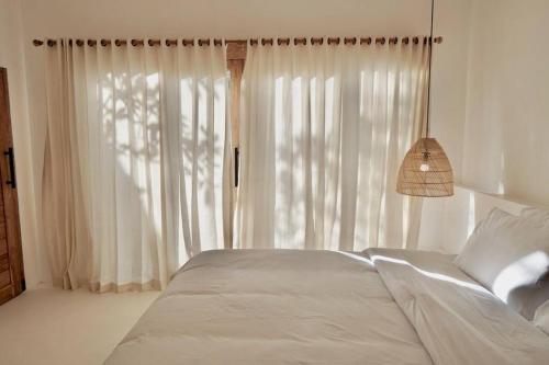Postel nebo postele na pokoji v ubytování Villa Enda