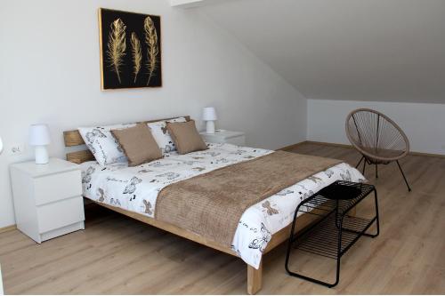 מיטה או מיטות בחדר ב-Apartmani Šara
