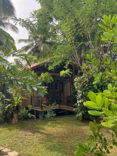 Jardín al aire libre en Mango Tree House