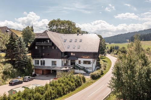 an aerial view of a house with a road at stuub jostal in Titisee-Neustadt