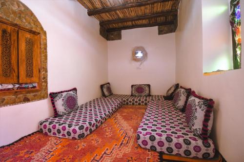 Кровать или кровати в номере Authentic Moroccan Family Homestay