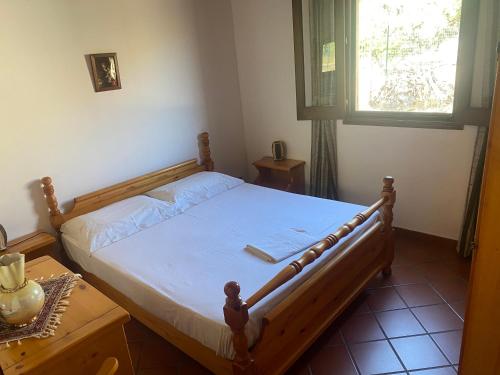 Tempat tidur dalam kamar di Villa Picciurro