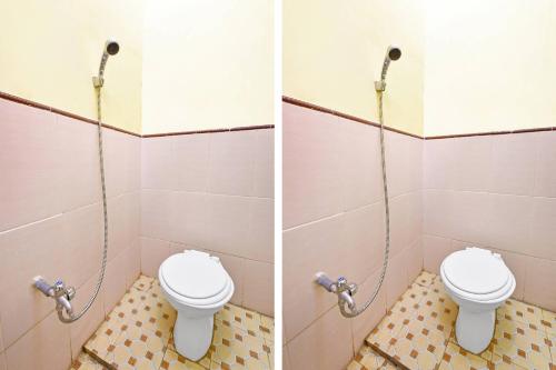 Et badeværelse på SPOT ON 91357 Hotel Mulyo